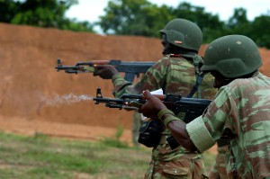 BEMBEREKE, Benin (June 16, 2009) - Beninese soldiers fire on the move as part of a joint U.S.-Benin live fire exercise in preparation for SHARED ACCORD 2009's final field training event. SHARED ACCORD is a scheduled, combined U.S.-Benin exercise designed to improve interoperability and mutual understanding of each nations military tactics, techniques and procedures. Humanitarian and civil affairs events run concurrent with the military training. The exercise is scheduled to conclude June 25. (Official Marine Corps photo by Lance Cpl. Jad Sleiman)