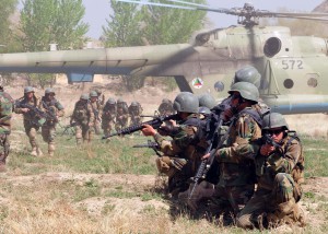 Afghan Commandos from the Sixth Commando Kandak practices infiltration techniques using the Afghan National Army Air Corps Mi-17 helicopter on April 1 at Camp Morehead in the outer regions of Kabul. The training was in preparation for future air assault missions needed in order to disrupt insurgent activity and bring stability to the population and the region.