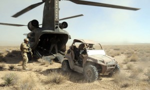 Soldiers with Special Operations Task Force - South prepare to load an all-terrain vehicle on to a CH-47 Chinook helicopter in preparation for a rapid offload during operations Oct. 1 in the Maruf District, Kandahar Province, Afghanistan. (U.S. Army photo by Spc. Jesse LaMorte / Special Operations Task Force - South).