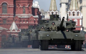 Russian servicemen stand atop T-14 tanks with the Armata Universal Combat Platform during the Victory Day parade, marking the 71st anniversary of the victory over Nazi Germany in World War Two, at Red Square in Moscow, Russia, May 9, 2016.     REUTERS/Sergei Karpukhin