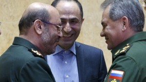 Russian Defense Minister Sergei Shoigu (R) and his Iranian counterpart Hossein Dehghan (L) shake hands during their meeting in Moscow, Russia, February 16, 2016 in this handout provided by Russian Defence Ministry. REUTERS/Vadim Savitsky/Russian Defence Ministry/Handout via Reuters ATTENTION EDITORS - THIS PICTURE WAS PROVIDED BY A THIRD PARTY. REUTERS IS UNABLE TO INDEPENDENTLY VERIFY THE AUTHENTICITY, CONTENT, LOCATION OR DATE OF THIS IMAGE. FOR EDITORIAL USE ONLY. NOT FOR SALE FOR MARKETING OR ADVERTISING CAMPAIGNS. THIS PICTURE IS DISTRIBUTED EXACTLY AS RECEIVED BY REUTERS, AS A SERVICE TO CLIENTS. NO SALES. NO ARCHIVES.