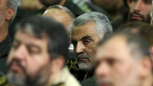 FILE - In this Tuesday, Sept. 17, 2013 file photo released by an official website of the office of the Iranian supreme leader, then chief of the Quds Force of Iran's Revolutionary Guard, Ghasem Soleimani, attends a meeting of the commanders of the Revolutionary Guard with Supreme Leader Ayatollah Ali Khamenei in Tehran, Iran. The fight against the Islamic State has deepened the bond between Iraqs Shiite-led government and Iran, to the extent that Iran has easily eclipsed the United States in the eyes of many Iraqis as the main ally in defeating the extremists. (AP Photo/Office of the Iranian Supreme Leader, File)