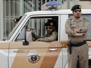 Local Input~ Saudi policemen form a check point near the site where a demonstration was expected to take place in Riyadh, Saudi Arabia, Friday, March 11, 2011. Hundreds of police have deployed on the streets of the Saudi capital ahead of planned protests calling for democratic reforms in the kingdom. The rare security turnout highlights authorities' concerns about the possibility of people gathering after Friday prayers. Although protests have so far been confined to small protests in the country's east where minority Shiites live, activists have been emboldened by other uprisings and have set up online groups calling for protests in Riyadh Friday.  (AP Photo/Hassan Ammar)