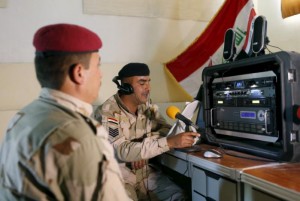 Iraqi soldiers work at a radio station at Makhmour base, Iraq April 17, 2016. REUTERS/Ahmed Jadallah